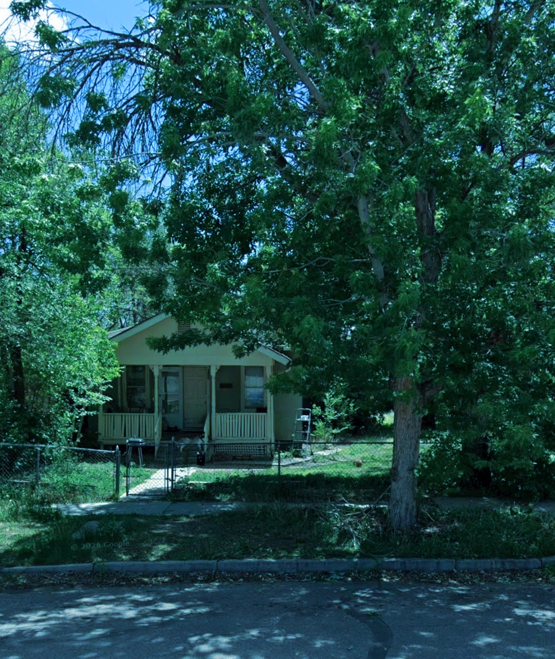 Shooks Run cottage tucked behind mature cottonwood trees, Old South Central Colorado Springs